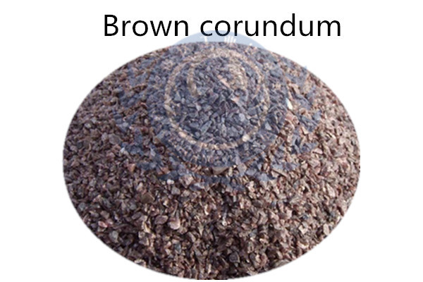 Impurities in brown corundum - white spots